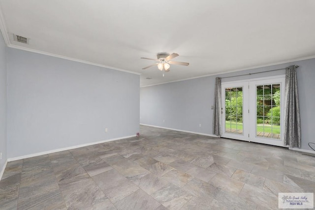 empty room with visible vents, a ceiling fan, stone finish flooring, crown molding, and baseboards