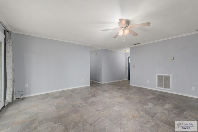 spare room with visible vents, baseboards, and ornamental molding