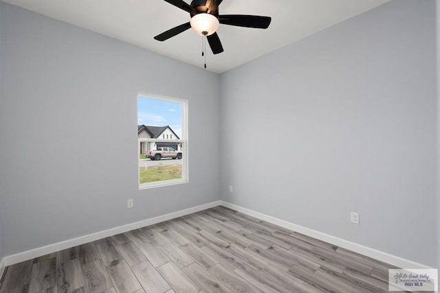 2023 Peace Dr # 23, La Feria, TX 78559 - empty room with light wood finished floors, baseboards, and ceiling fan