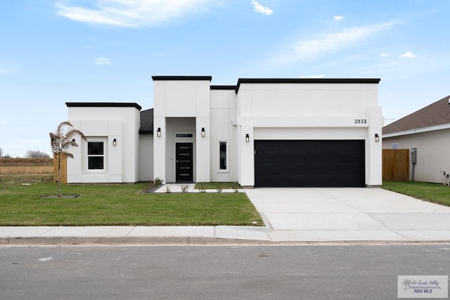 2023 Peace Dr # 23, La Feria, TX 78559 - modern home featuring stucco siding and driveway