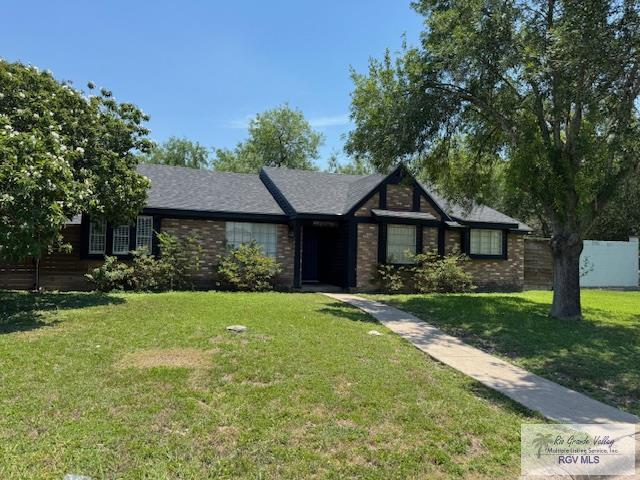 1875 Sancho Panza Cir, Brownsville, TX 78521 - view of front facade with brick siding