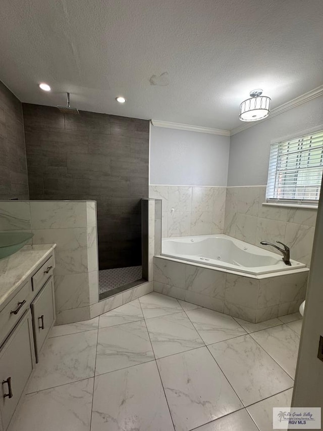 1875 Sancho Panza Cir, Brownsville, TX 78521 - bathroom with a jetted tub, crown molding, a textured ceiling, marble look tile flooring, and vanity