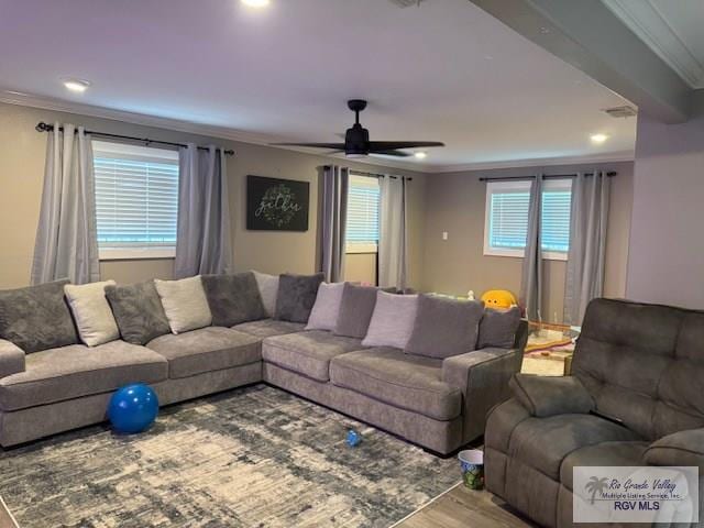 1875 Sancho Panza Cir, Brownsville, TX 78521 - living room featuring ornamental molding, wood finished floors, a ceiling fan, and recessed lighting