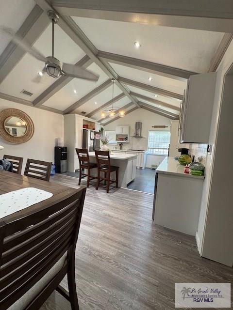 1875 Sancho Panza Cir, Brownsville, TX 78521 - dining area with dark wood-type flooring, recessed lighting, and ceiling fan