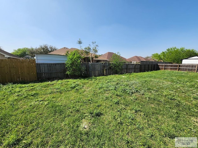 view of yard with fence