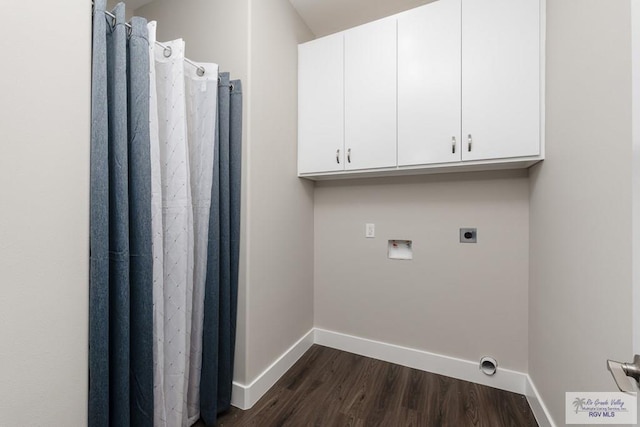 laundry room featuring hookup for an electric dryer, hookup for a washing machine, cabinets, and dark wood-type flooring