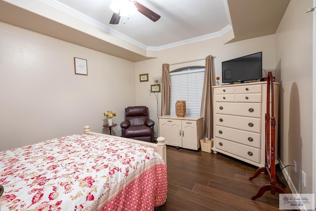 bedroom with dark hardwood / wood-style flooring, ceiling fan, and crown molding