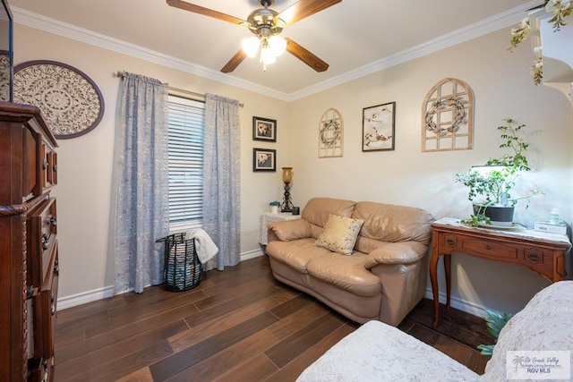 living room featuring dark hardwood / wood-style flooring, ceiling fan, and crown molding