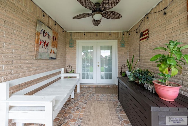 entrance to property with french doors and ceiling fan