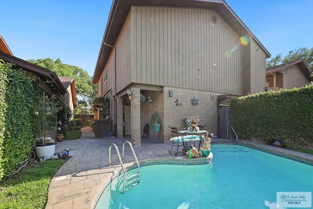 105 E Austin Ave, Harlingen, TX 78550 - view of swimming pool with a patio and a fenced backyard