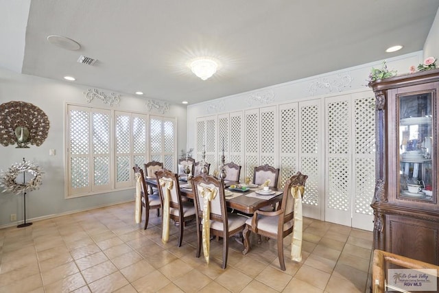105 E Austin Ave, Harlingen, TX 78550 - dining space featuring light tile patterned flooring and recessed lighting