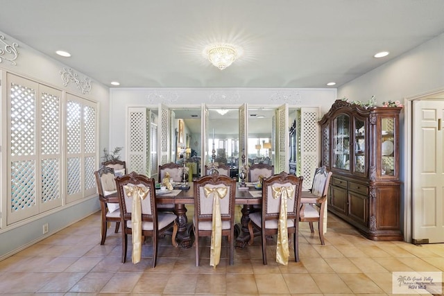 105 E Austin Ave, Harlingen, TX 78550 - dining room featuring light tile patterned floors and recessed lighting