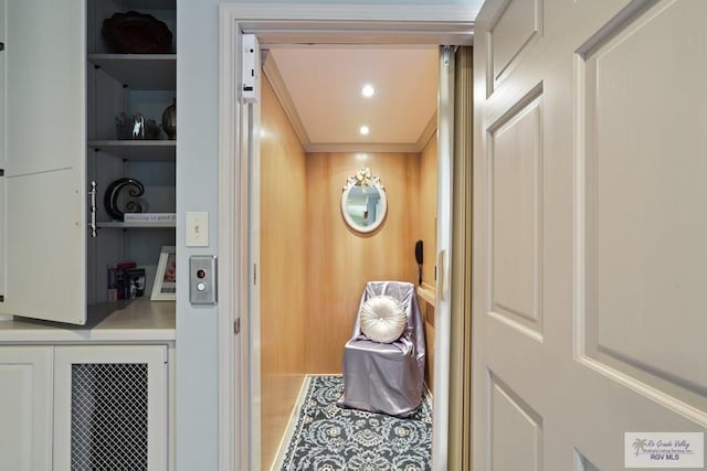 105 E Austin Ave, Harlingen, TX 78550 - detailed view of ornamental molding, elevator, and built in shelves