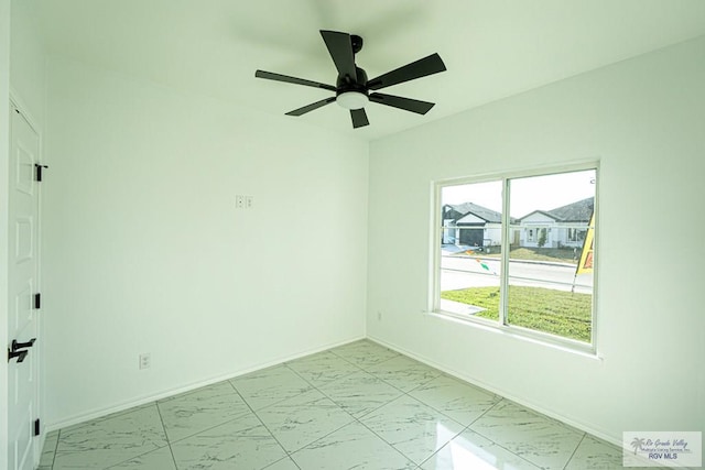 unfurnished room featuring ceiling fan