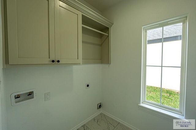 laundry room with hookup for a washing machine, hookup for an electric dryer, and cabinets