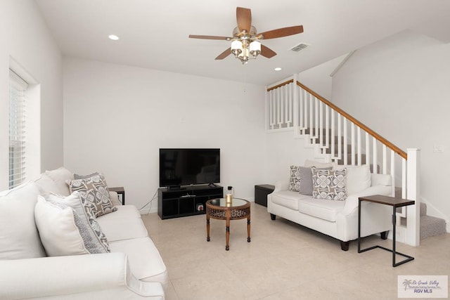 living room featuring ceiling fan