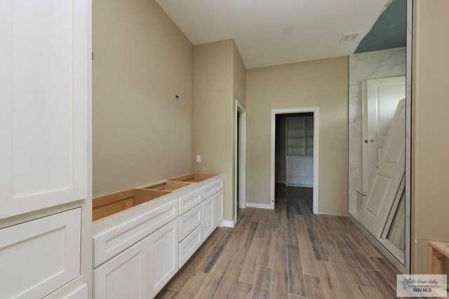 corridor featuring light wood-type flooring