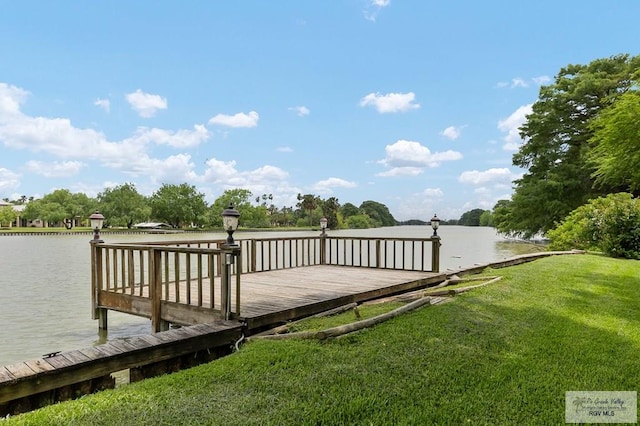 27603 Palo Verde Rd, San Benito, TX 78586 - dock with a yard and a water view