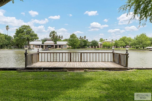 27603 Palo Verde Rd, San Benito, TX 78586 - dock with a lawn and a deck with water view