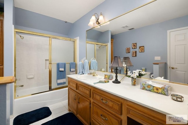 27603 Palo Verde Rd, San Benito, TX 78586 - bathroom featuring tile patterned flooring, vanity, and shower / bath combination with glass door