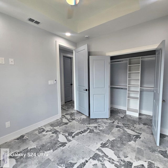 unfurnished bedroom featuring baseboards, visible vents, a closet, and recessed lighting