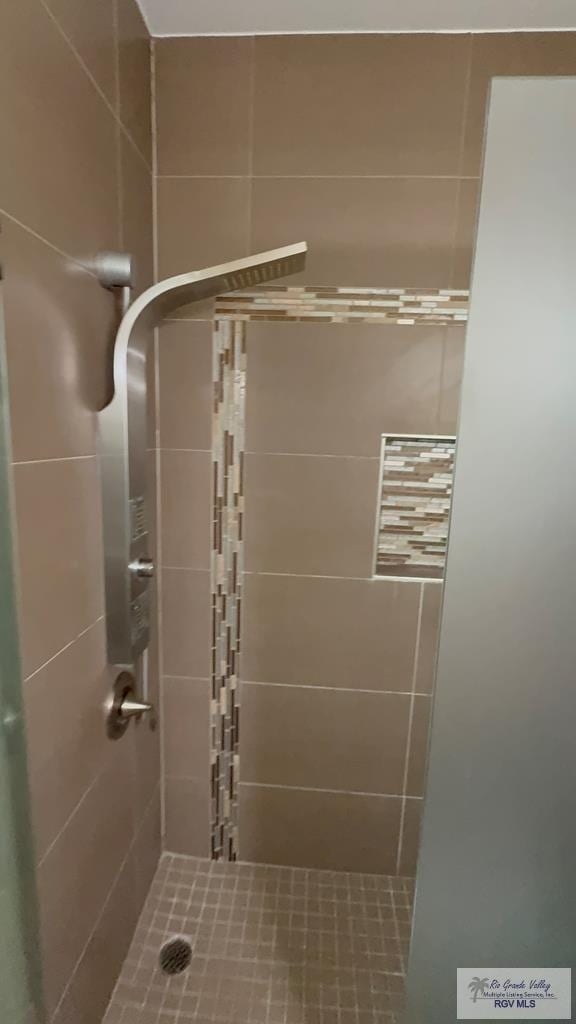 full bathroom with a stall shower