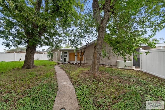 view of front of home with a front lawn