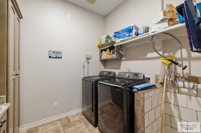 laundry area featuring washer and dryer