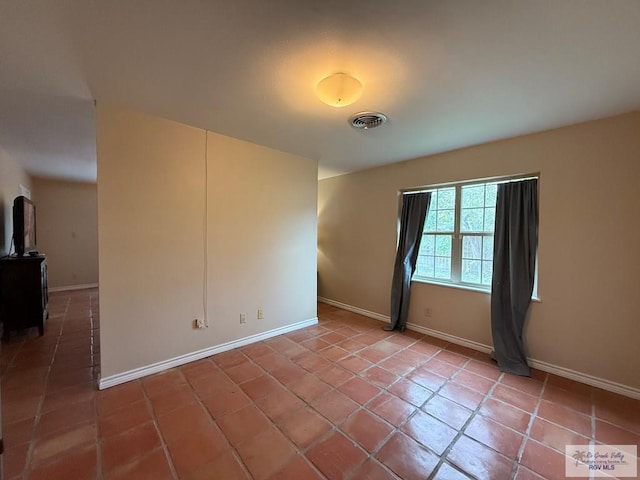 view of tiled empty room