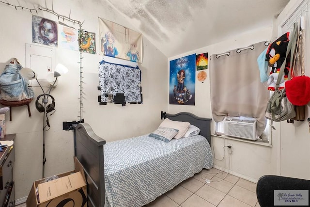 tiled bedroom with cooling unit