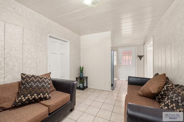 living room with light tile patterned flooring