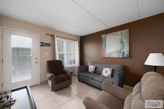 living room with light tile patterned flooring