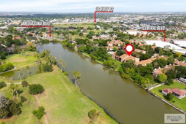aerial view with a water view and golf course view