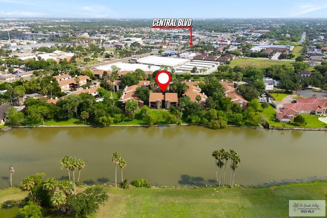 birds eye view of property featuring a water view and a residential view