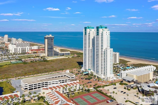 aerial view featuring a view of the beach and a water view