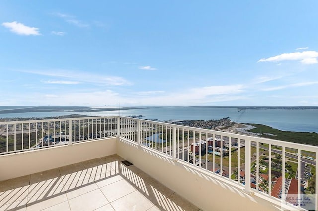 balcony featuring a water view