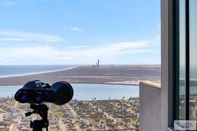 view of water feature with a beach view