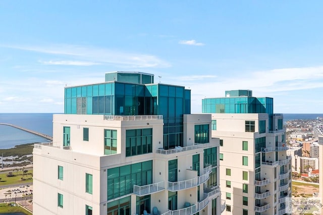 view of building exterior featuring a water view