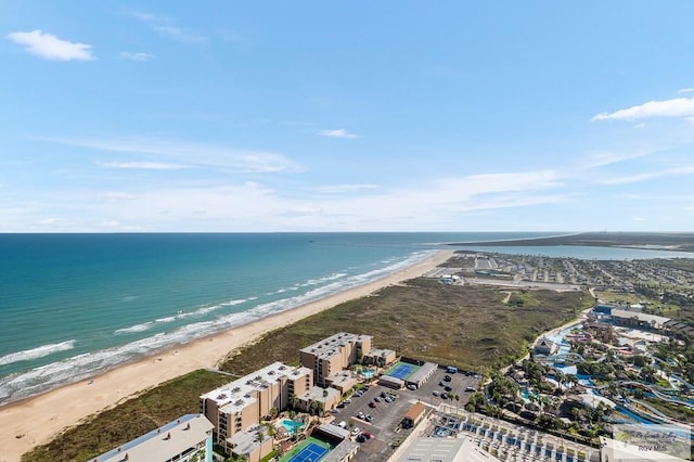 birds eye view of property featuring a view of the beach and a water view