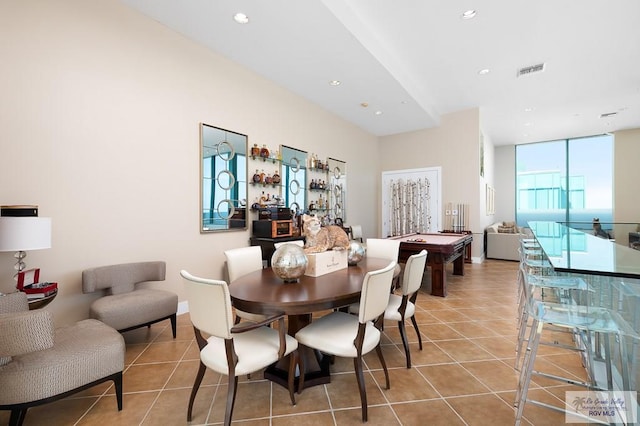 dining space featuring light tile patterned floors and billiards