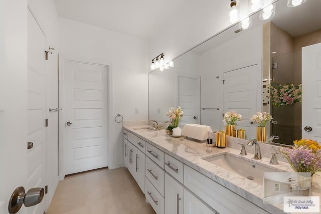 bathroom featuring vanity and tile patterned floors