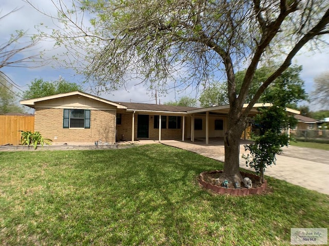 single story home with concrete driveway, brick siding, a front yard, and fence