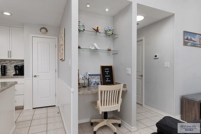 office with light tile patterned floors