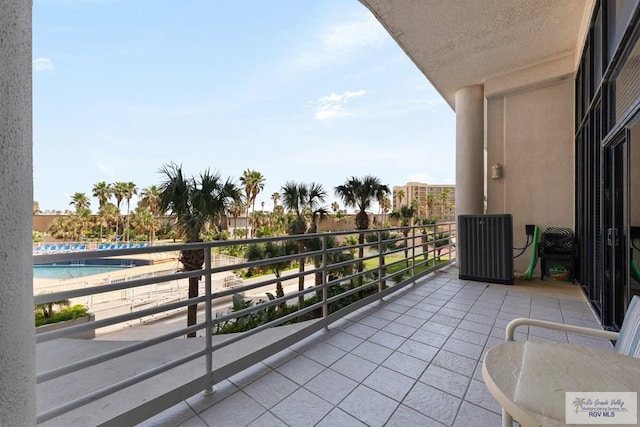 balcony featuring central air condition unit