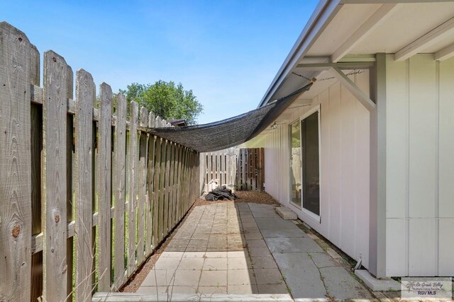 view of patio with fence