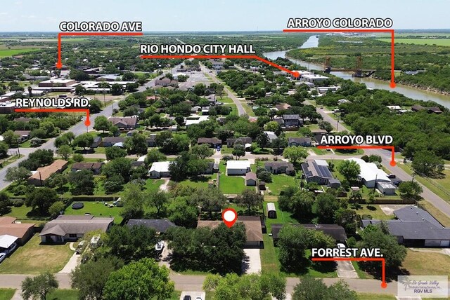 birds eye view of property featuring a water view and a residential view