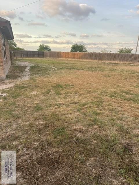 view of yard with fence