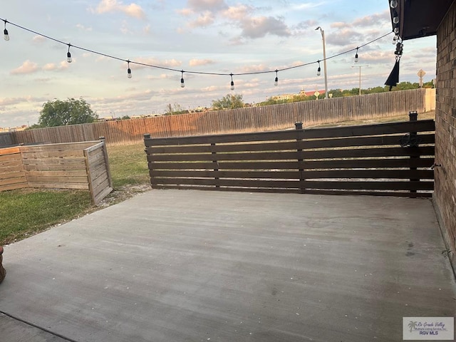 view of gate with fence