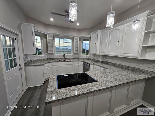 27406 Kelly Ct, La Feria, TX 78559 - kitchen featuring open shelves, black electric stovetop, white cabinetry, a sink, and recessed lighting