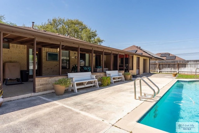 1916 Loquat Dr, Harlingen, TX 78552 - view of swimming pool with a patio area